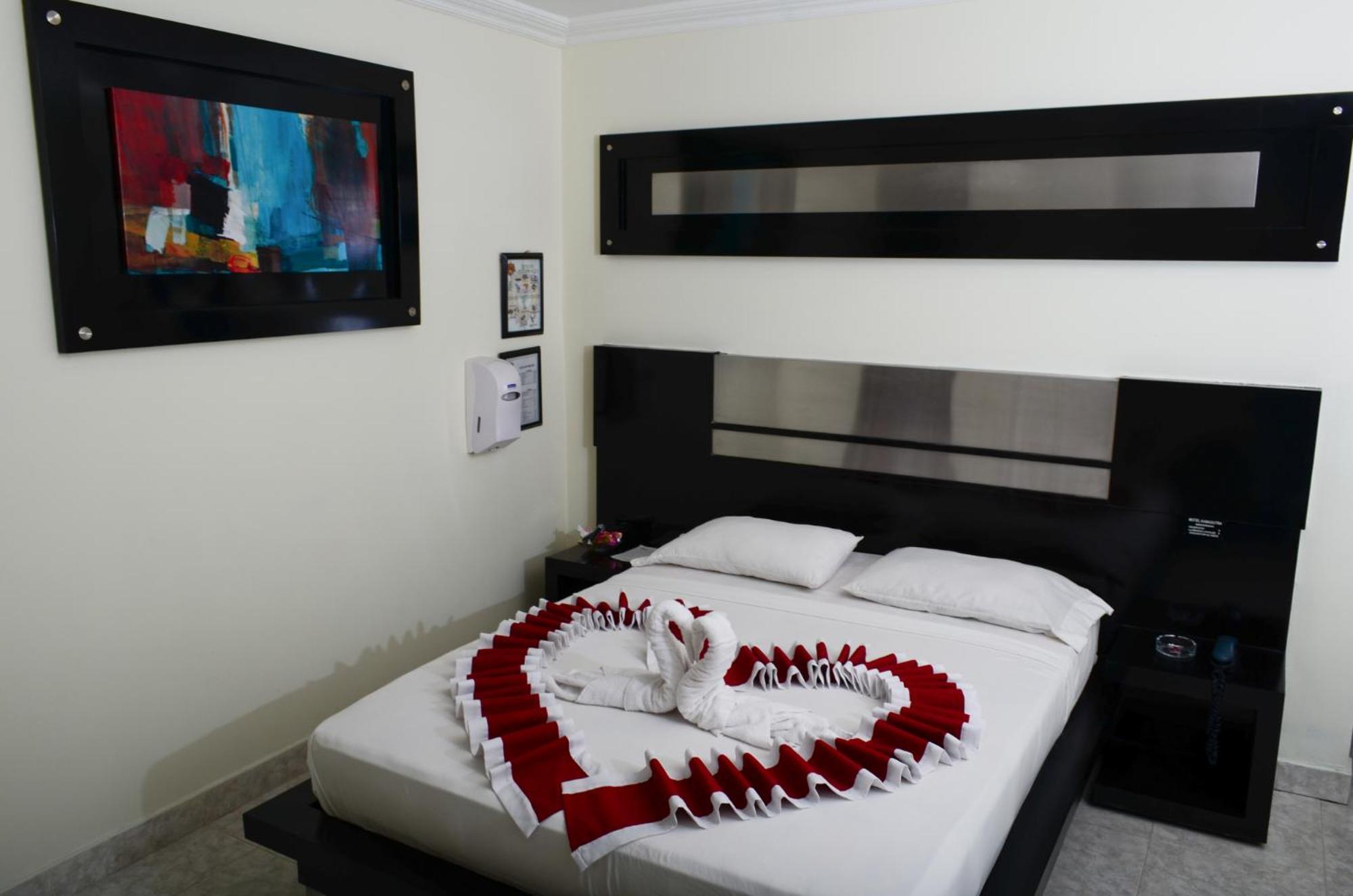Torettos Yumbo Habitación foto